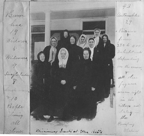 group of 10 women wearing heavy coats and scarves